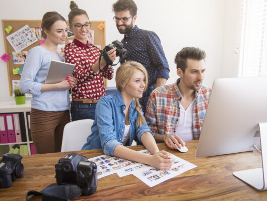 People checking out the features on a CRM